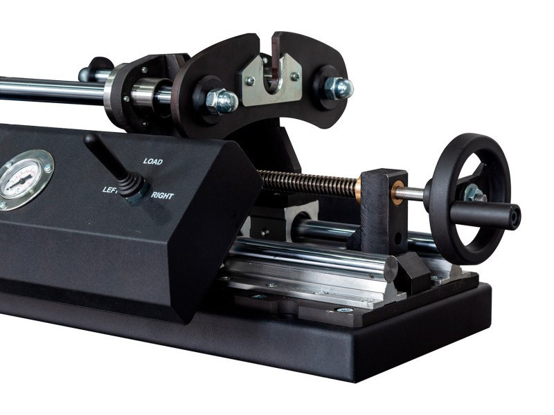 Mechanism for testing steering racks under load